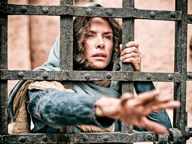 FILE - This publicity file image released by History shows Roma Downey as Mother Mary in a scene from "The Bible," on History. NBC says it will air a sequel to the hit cable miniseries "The Bible." The network said Monday, July 1, 2013, that it will join with producer Mark Burnett and his actress-wife, Roma Downey, on the sequel. (AP Photo/History, Casey Crawford, File)