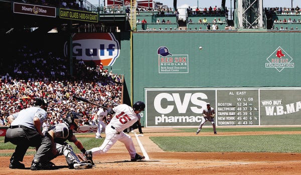 Dustin Pedroia gets a view of his two-run double to left field during the first inning of Thursday's victory over the San Diego Padres at Fenway Park.