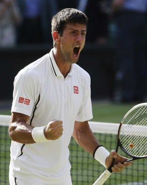 Novak Djokovic of Serbia reacts after defeating Juan Martin Del Potro of Argentina in their Men's singles semifinal match at the All England Lawn Tennis Championships in Wimbledon, London, Friday, July 5, 2013. (AP Photo/Anja Niedringhaus)
