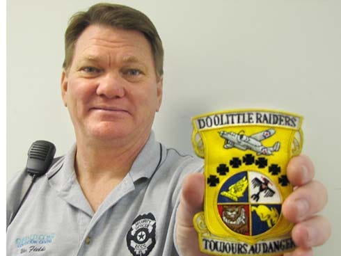 Wes Fields shows off his Doolittle Raiders patch. Fields is one of just two people outside of the elite group of World War II heroes to receive the patch.