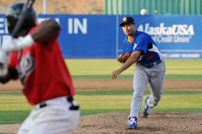 The Dodgers' Ted Lilly pitches against the Mavericks on Saturday night in Adelanto while on a rehabilitation assignment with the Quakes.