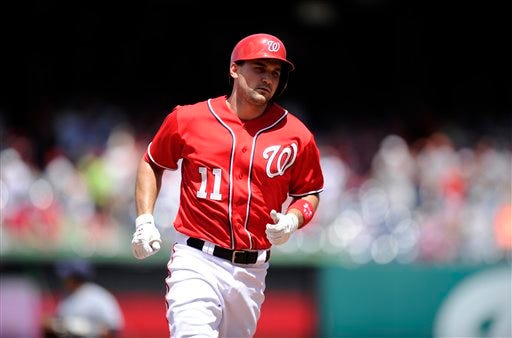 Washington Nationals' Ryan Zimmerman rounds the bases after his grand slam against the San Diego Padres during the third inning of a baseball game, Sunday, July 7, 2013, in Washington.