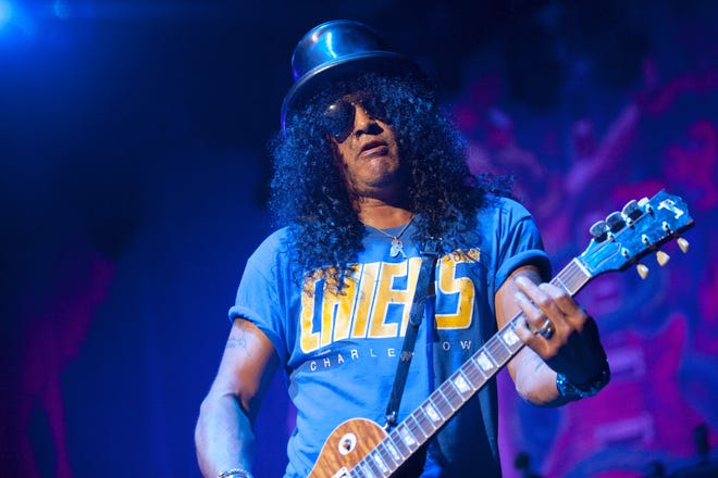 Legendary guitarist Slash plays to a packed house with Myles Kennedy and the Conspirators on Saturday night at the Peoria Civic Center Theater.