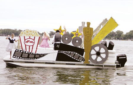 First place in the 2013 flotilla at Palmer Lake in Colon went to Ryan Doherty and Grant Sahr for their Hollywood-themed boat.