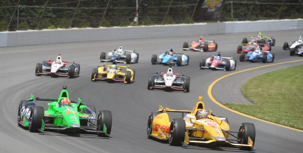 Cars circle the track during Sunday's IndyCar race at Pocono Raceway