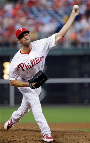 Philadelphia Phillies' Cole Hamels pitches in the third inning of a baseball game against the Washington Nationals, Tuesday, July 9, 2013, in Philadelphia. (AP Photo/Matt Slocum)