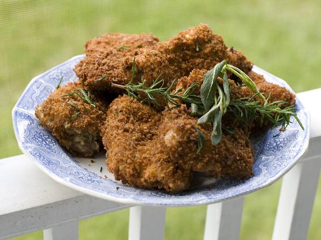 Fried chicken from an Associated Press recipe is crisped to perfection, yet moist and tender inside.