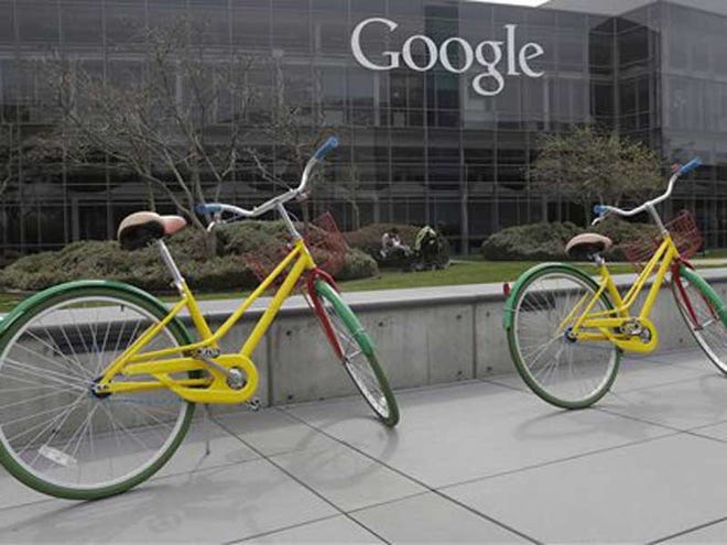 FILE - This March 15, 2013, file photo shows Google bicycles at the Google campus in Mountain View, Calif. In the era of intense government surveillance and secret court orders, a murky multimillion-dollar market has emerged. Paid for by U.S. tax dollars, but with little public scrutiny, surveillance fees charged in secret by technology and phone companies can vary wildly. While Microsoft, Yahoo and Google won’t say how much they charge, the American Civil Liberties Union found that email records can be turned over for as little as $25. (AP Photo/Jeff Chiu, File)