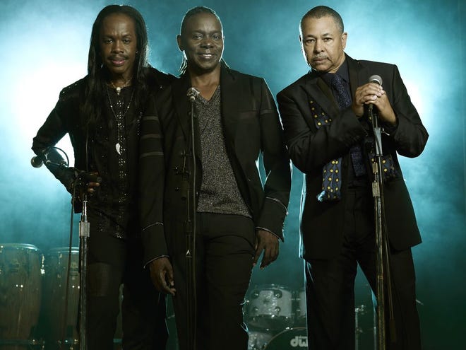 From left, Verdine White, Philip Bailey and Ralph Johnson of Earth, Wind & Fire. The group will release its first album in eight years on Sept. 10. It is will be titled “Now, Then & Forever.” (The Associated Press)
