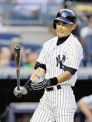 Ichiro Suzuki winces during an unproductive at-bat in the third inning against the Royals on Tuesday night in the Bronx.