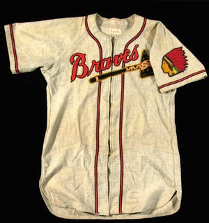 This undated photo released July 8, 2013 by Hunt Auctions shows a jersey worn by Milwaukee Braves great Warren Spahn. The jersey and other pieces of Spahn's memorabilia will be sold at a Live Auction at MLB All-Star FanFest on Monday, July 15, 2013 in New York. (AP Photo/Hunt Auctions)