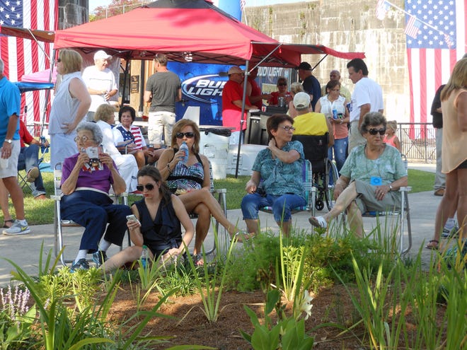 People enjoy the music at the 13th Annual July 4th Hometown Celebration on Thursday afternoon. 
POST SOUTH PHOTO/Peter Silas Pasqua
