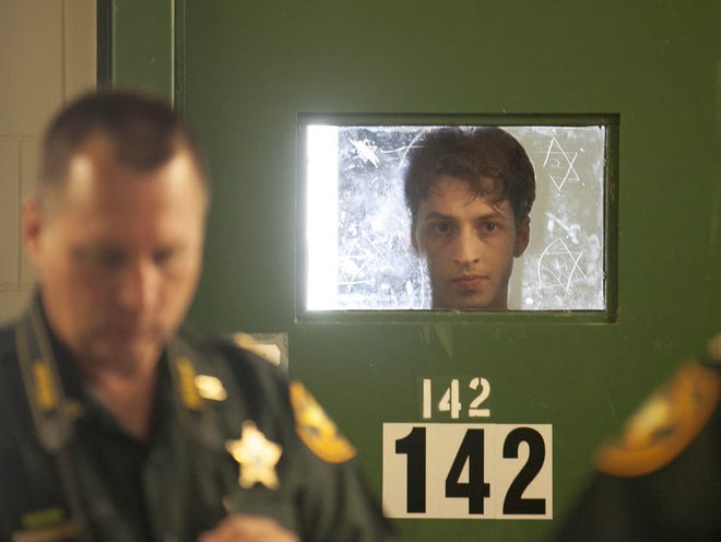 Accused killer and ring leader in the Seath Jackson Murder Michael Bargo stares out of his high security cell in the high security unit of the Marion County Jail in Ocala, FL on Thursday July 11, 2013. Sheriff Chris Blair has asked for a larger budget to address jail understaffing and replacing older vehicles among other things.