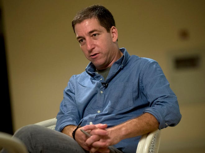 Journalist Glenn Greenwald speaks during an interview with the Associated Press in Rio de Janeiro, Brazil, Sunday, July 14, 2013.
