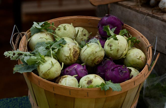 Freshly harvested kohlrabi from Norwell Farms at the Norwell Farmers’ Market at the South Shore Natural Science Center on Sunday, July 14, 2013.