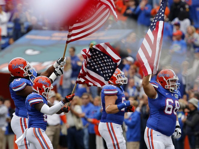 The Florida Gator football team takes to the field against Jacksonville State during Armed Forces recognition day and senior day at Ben Hill Griffin Stadium in Gainesville, Fla., Saturday, November 17, 2012.
