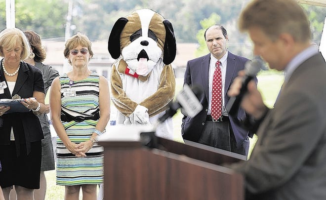 Hudson, the pediatrics mascot at Orange Regional Medical Center, was part of the group listening to Dr. Eric Fethke, at right, speak during the kickoff of the public fundraising phase for the hospital's new Pediatric Emergency Department.