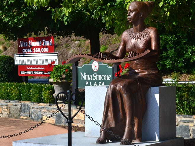 This bronze statue of singer Nina Simone sits downtown in a plaza between Trade Street and the railroad tracks. Sculptor Zenos Frudakis has only been paid $51,000 of the $106,000 cost of the piece.