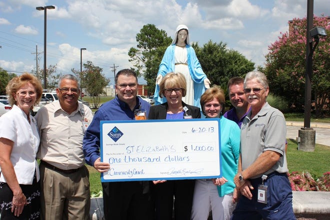Pictured from left to right: Caroline Conerly, Assistant Vice President of Medical Management; Victor Vidaurre, Assistant Vice President of Mission Integration; Ronnie Zacharias, Membership Manager, Sam's Club, Siegen Lane; Sue Knight, Chief Operating Officer, St. Elizabeth Hospital and St. Elizabeth Physicians; Jill Lee, Vice President, Patient Care; Rick Banker, Director of Laboratory and Cardiopulmonary Services; and Kevin Buckels, Certified Asthma Educator and Coordinator of the St. Elizabeth Asthma Education Program.
