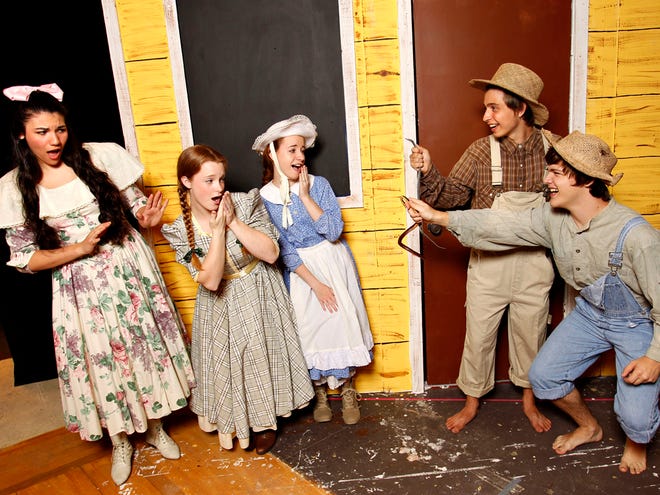 “The Adventures of Tom Sawyer: The Musical” features, from left, Marissa Vairo as Becky Thatcher, Amanda Gramig as Susie Rogers, Shaina Smola as Elanor Harper, Alex Christophy as Tom Sawyer and Chris Shaw as Huckleberry Finn through Aug. 4 at the Gainesville Community Playhouse.
