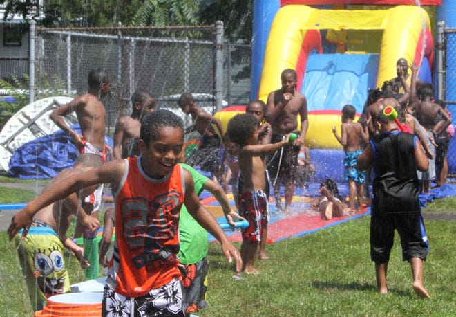There were plenty of Providence youngers having fun on the inflatable water slide Thursday at the Davey Lopes Recreation Center, but the center's pool did not open this year.