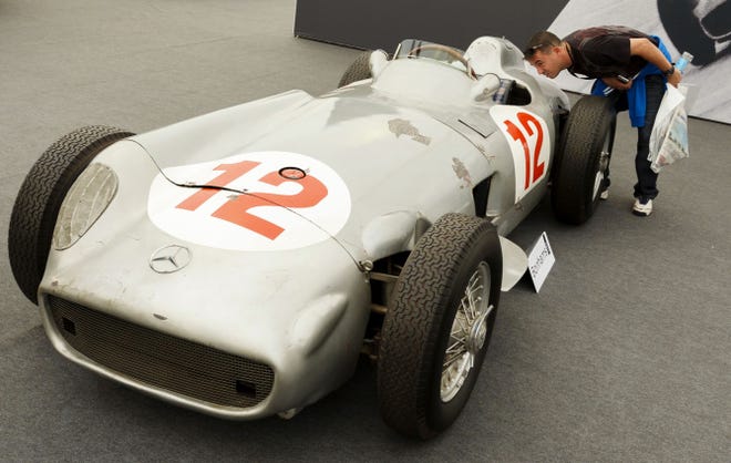 “You’re in a club of one with this car,” says an industry expert of the 1954 Mercedes, seen prior to auction, that Formula One legend Juan Manuel Fangio drove to victories in the 1954 German and Swiss Grand Prix races.