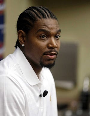 Cleveland Cavaliers' Andrew Bynum answers questions during a news conference on Friday in Independence, Ohio.