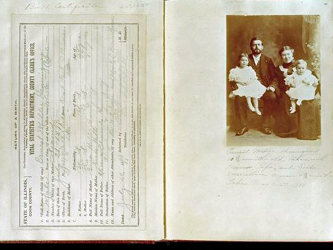 This photo provided July 17, 2013, by the John F. Kennedy Presidential Library shows the birth certificate and family photograph of Ernest Hemingway from a scrapbook created by his mother, Grace Hall Hemingway, at the John F. Kennedy Presidential Library in Boston. The JFK Library and Museum in Boston has digitized pages from five scrapbooks that the mother of Ernest Hemingway made to document his early life. (AP Photo/John F. Kennedy Presidential Library)