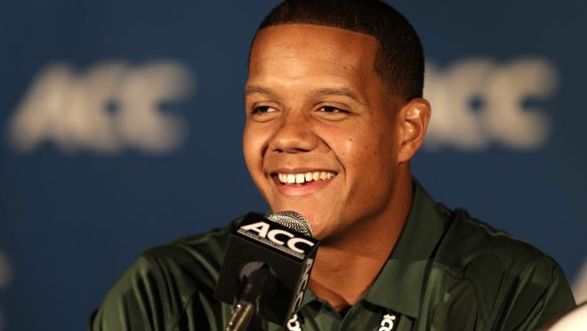 Miami's Stephen Morris speaks to the media during the Atlantic Coast Conference Media Day in Greensboro, N.C., Sunday, July 21, 2013. (AP Photo/Chuck Burton)