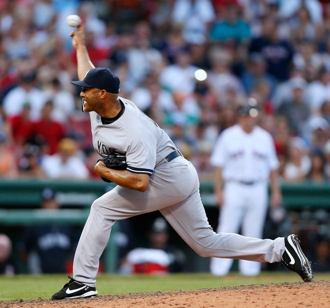 New York Yankees' Mariano Rivera pitches in the ninth inning of a baseball game against the Boston Red Sox in Boston, Saturday, July 20, 2013. The Yankees won 5-2. ()