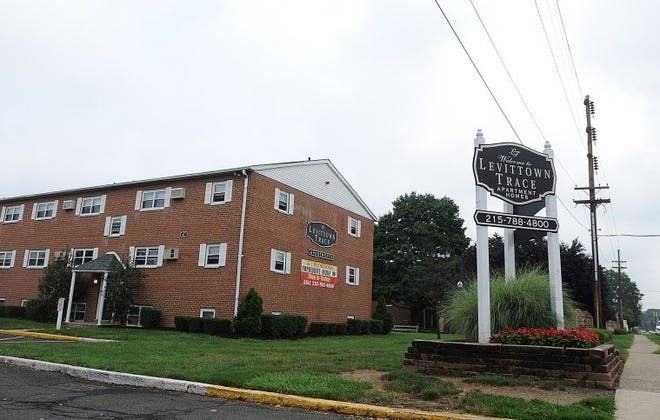 A body was found in the parking lot of Levittown Trace Apartments on Monday morning.