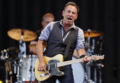 Bruce Springsteen performs at Fenway Park in Boston in August, 2013. (AP Photo/Michael Dwyer, file)