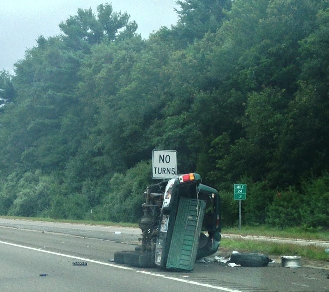 The driver of this truck was hospitalized Monday after it flipped on Route 24 north at Raynham-Taunton exit.