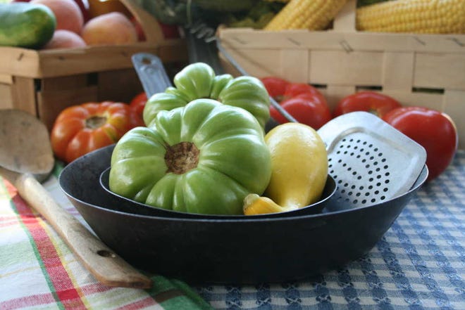 Home gardens and farmers markets are bursting at the seams with fresh, local produce, such as tomatoes and summer squash. Pan fried green tomatoes and squash fritters are among the most popular dishes the season has to offer.