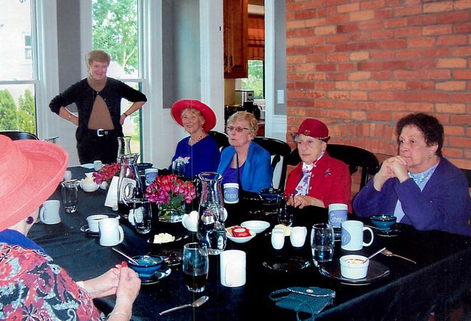 Patricia's Guest House hostess/owner Patricia Cardillo chats with members of the Hamilton Red Hats during their recent visit. Pictured are, from left, Cardillo, along with Red Hats Carolyn Dearnaly, Jan Frutiger, Sylvia Roe, Fran Gargiulo, and in foreground, Lorraine Drazek.