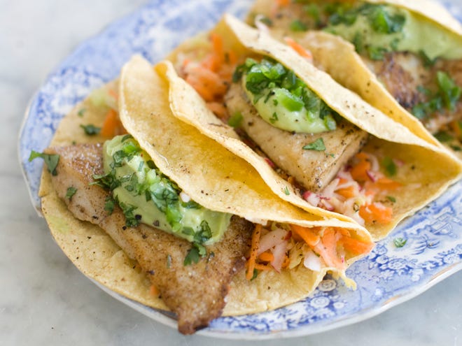 Fish Tacos With Buttermilk Avocado Puree is light on calories, but heavy on flavor.