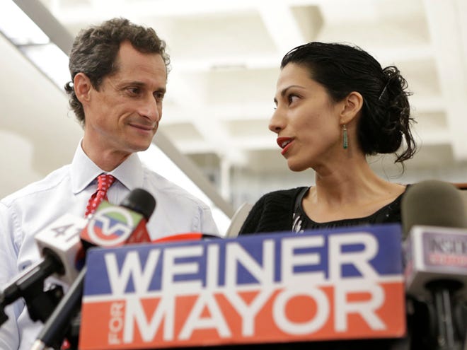 Huma Abedin, alongside her husband, New York mayoral candidate Anthony Weiner, speaks during a news conference on July 23 at the Gay Men's Health Crisis headquarters in New York. When Abedin's name and face first started appearing in the media six years ago, lots of people couldn’t help but wonder what this beautiful, ambitious woman with high-fashion sense and a world-class rolodex saw in Weiner. That’s a question New Yorkers are asking themselves again.