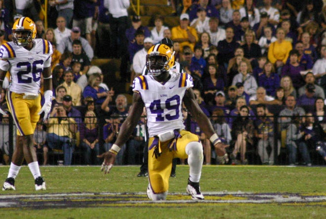 LSU defensive end Barkevious Mingo gestures to the crowd against Mississippi State last season. Mingo signed with the Cleveland Browns on Sunday. 
POST SOUTH PHOTO/Peter Silas Pasqua
