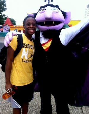 Loughery DeMille (Left) poses for a picture with Count von Count (Right) at Sesame Place. The Count is one of many characters DeMille plays as at the park.