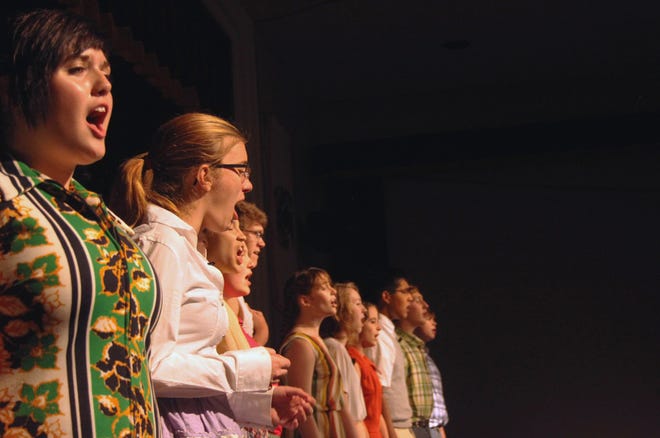 Cast members of the MRHS Drama Club production “All Shook Up” sing together during a Wednesday rehearsal. The musical will show 7 p.m. tonight and at the same time on Saturday.