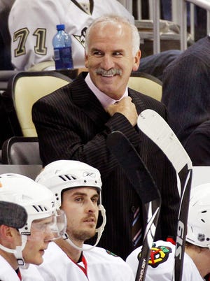 Chicago Blackhawks coach Joel Quenneville was given a three-year contract extension on Friday, July 26, 2013. (AP Photo/Gene J. Puskar, File)
