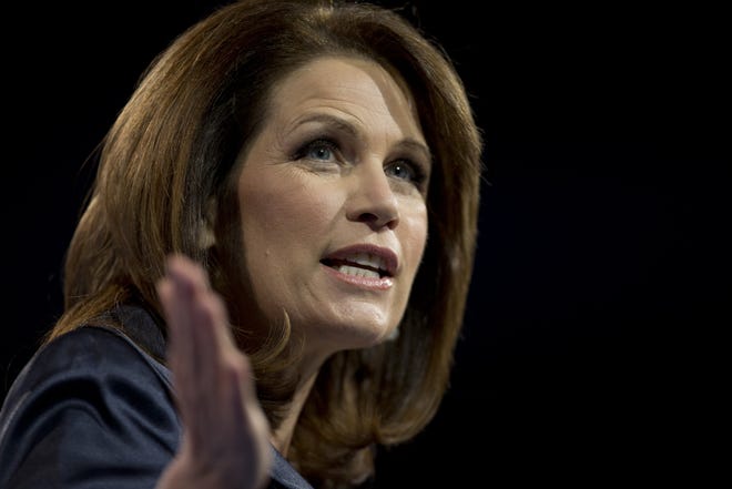 In this March 16, 2013 file photo, Rep. Michele Bachmann, R- Minn., speaks at the 40th annual Conservative Political Action Conference in National Harbor, Md. Bachmann said Wednesday, May 29, 2013, that she will not run for re-election in 2014. (AP Photo/Carolyn Kaster)