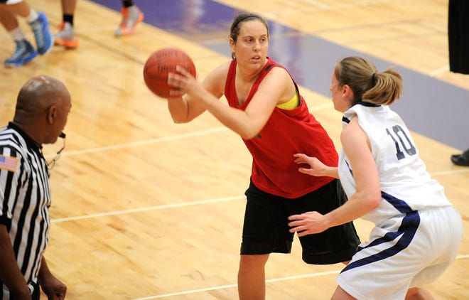 Amy Bolerjack of the Hustlers basketball team looks to pass the ball while competing in the Show-Me State Games Friday. Her squad, which also features twin and fellow former Hickman standout Jodi Himmelberg, fell in 19-and-over action.