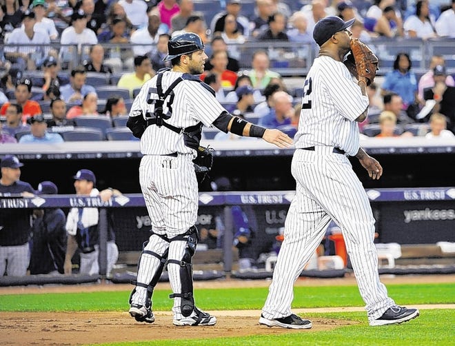 It was a long night for Yankees catcher Austin Romine and starting pitcher CC Sabathia against the Tampa Bay Rays Friday.