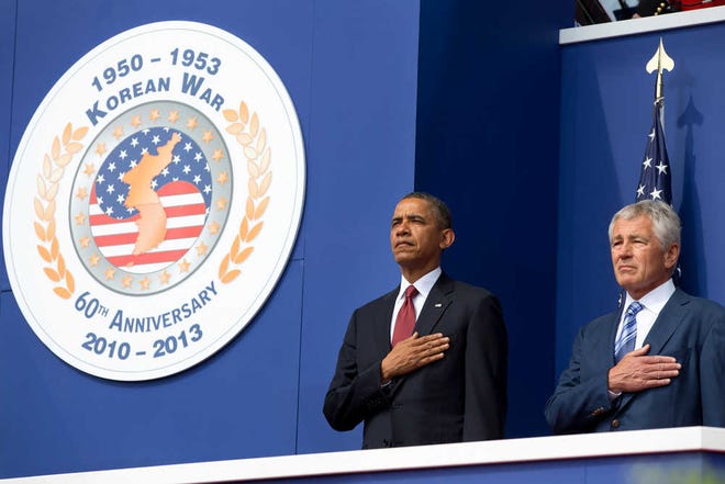 President Barack Obama and Defense Secretary Chuck Hagel participate in a commemorative ceremony Saturday for the 60th anniversary of the end of the Korean War, near the Korean War Veterans Memorial on the National Mall in Washington.