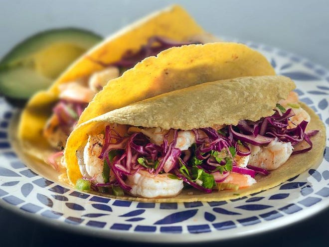 Tequila brings a bite to the marinade for this recipe for shrimp tacos.