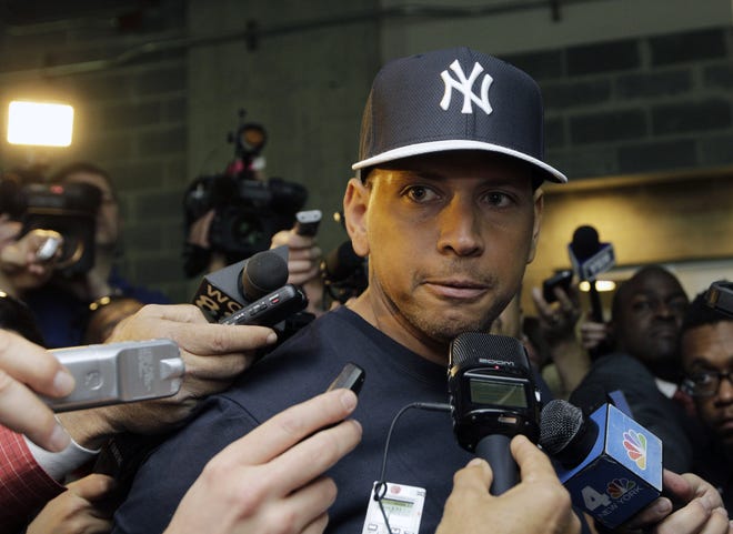 New York Yankees' Alex Rodriguez talks to reporters outside the Yankees' clubhouse in New York. Injuries have kept him off the field for more than half the season and now A-Rod faces discipline from Major League Baseball in its drug investigation, possibly up to a lifetime ban.