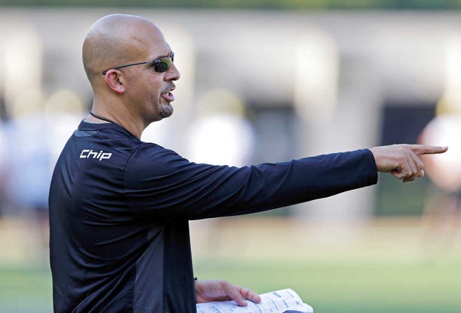 Vanderbilt coach James Franklin supervises the team's first practice with the word "Chip" on his shoulder on Thursday, Aug. 1, 2013, in Nashville, Tenn. It is his way of stoking passion and excitement from both his assistants and the players to continue building on their recent success. (Mark Humphrey/AP)