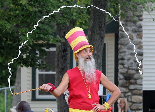 Trevor The Games Man twirls a ribbon during the Kids Night Concert in Mendon, Wednesday.