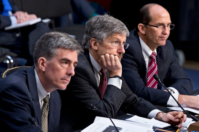 From left, National Security Agency Deputy Director John C. Inglis; Robert 
Litt, general counsel in the Office of Director of National Intelligence; 
and Sean Joyce, deputy director of the FBI, testify on Capitol Hill on 
Wednesday. AP PHOTO / J. SCOTT APPLEWHITE